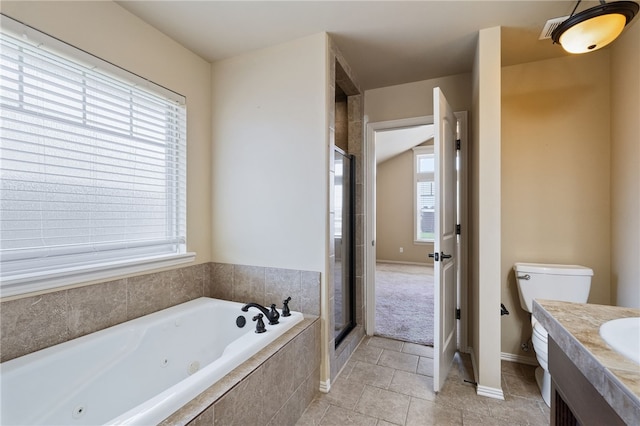 1232 Big Oak Dr, Alma, AR 72921 - bathroom featuring a tub with jets, plenty of natural light, and a shower stall