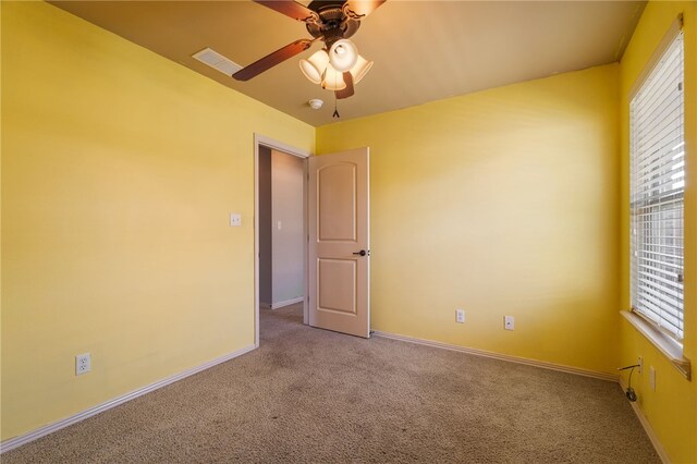 1232 Big Oak Dr, Alma, AR 72921 - spare room featuring carpet flooring and a ceiling fan