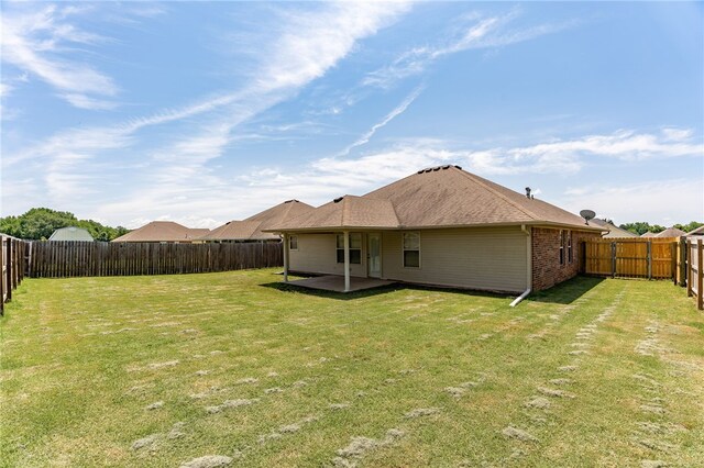 1232 Big Oak Dr, Alma, AR 72921 - rear view of property with a patio, a fenced backyard, and brick siding