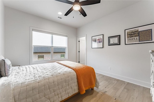 8003 W Claverton St, Rogers, AR 72758 - bedroom featuring light wood-type flooring and ceiling fan
