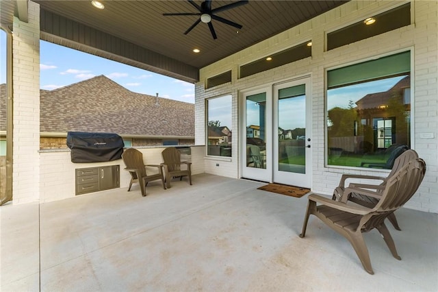 8003 W Claverton St, Rogers, AR 72758 - view of patio / terrace with an outdoor kitchen and ceiling fan