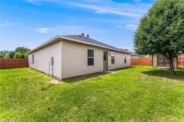 3530 Reynolds Ave, Springdale, AR 72764 - rear view of property with a fenced backyard and an outdoor structure