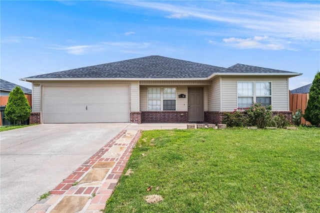 3530 Reynolds Ave, Springdale, AR 72764 - ranch-style house with brick siding, an attached garage, a front lawn, and driveway