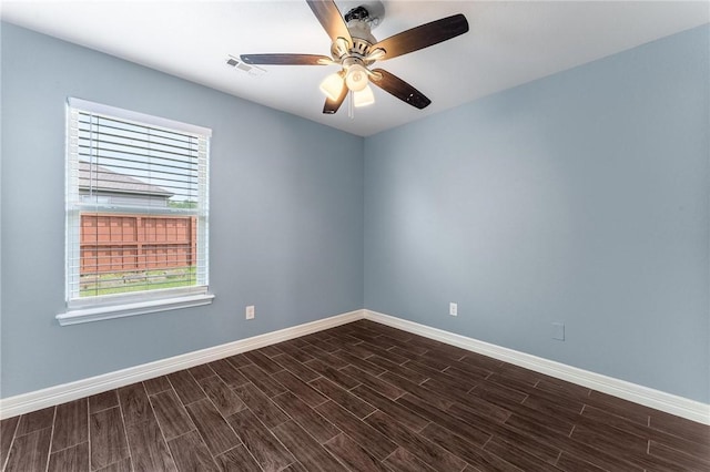 3530 Reynolds Ave, Springdale, AR 72764 - spare room featuring healthy amount of natural light, dark wood finished floors, and a ceiling fan