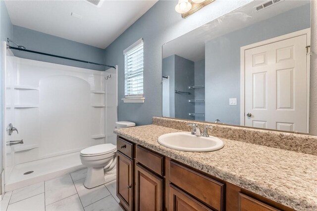 3530 Reynolds Ave, Springdale, AR 72764 - bathroom featuring a shower, vanity, and marble look tiles
