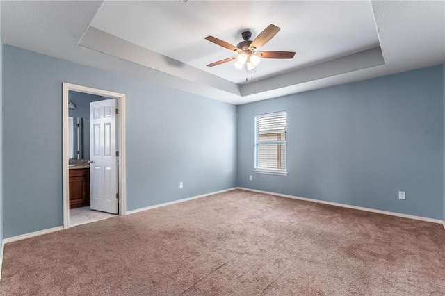 3530 Reynolds Ave, Springdale, AR 72764 - unfurnished room with a tray ceiling, carpet, and ceiling fan