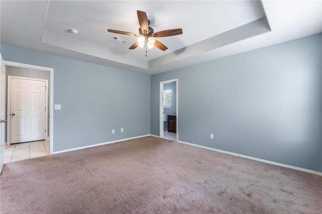 3530 Reynolds Ave, Springdale, AR 72764 - empty room with a raised ceiling, light colored carpet, a ceiling fan, and a smoke detector