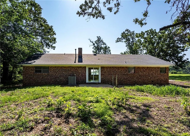 50233 S 725th Rd, Colcord, OK 74338 - rear view of property featuring brick siding and a patio area