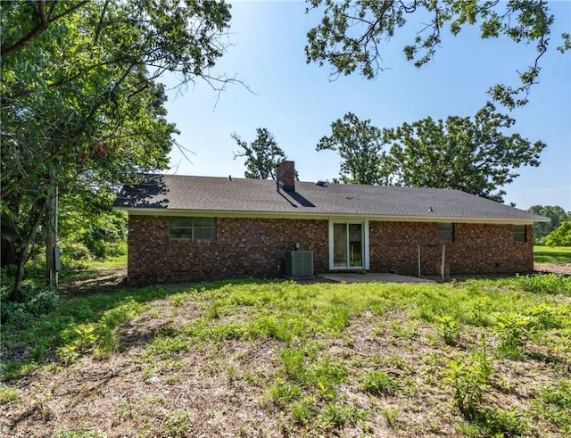 50233 S 725th Rd, Colcord, OK 74338 - back of house featuring brick siding, a chimney, and a patio