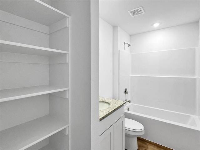 960 Hudson St, Prairie Grove, AR 72753 - full bath with shower / bathtub combination, vanity, and wood finished floors