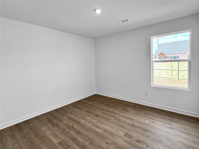 960 Hudson St, Prairie Grove, AR 72753 - spare room with dark wood-style floors and baseboards