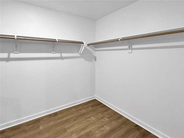 960 Hudson St, Prairie Grove, AR 72753 - spacious closet with dark wood-type flooring