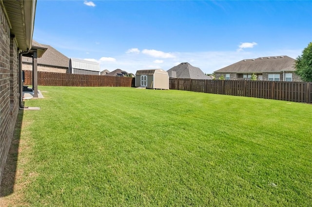 1511 Aniston Rd, Centerton, AR 72719 - fenced backyard with a storage unit