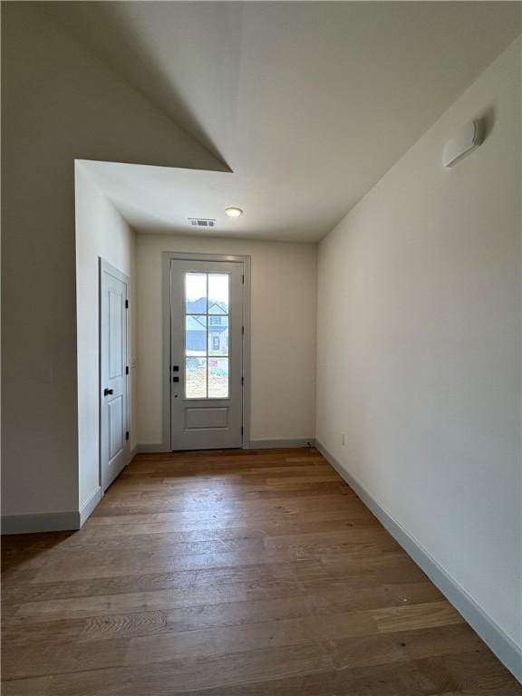 1309 Carrara, Tontitown, AR 72762 - doorway to outside with wood finished floors and recessed lighting