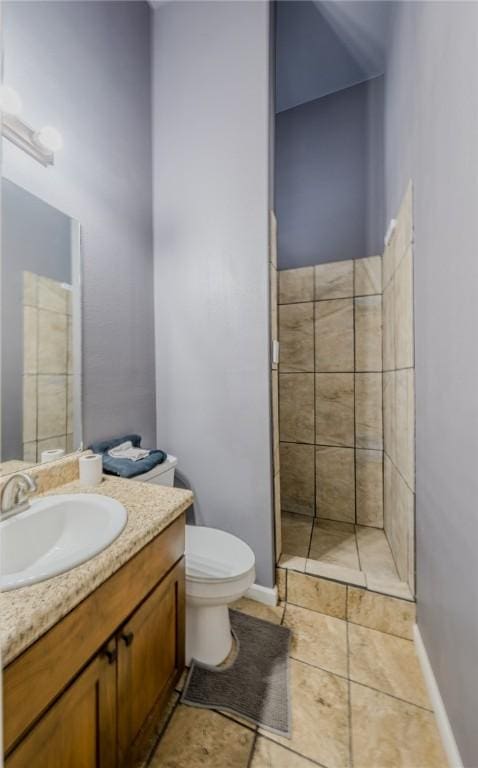 19959 Rheas Community Rd, Lincoln, AR 72744 - bathroom with vanity, a tile shower, and tile patterned flooring