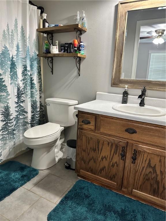 20796 Dawn Hill E Rd, Gentry, AR 72734 - bathroom with vanity, tile patterned flooring, a ceiling fan, and curtained shower