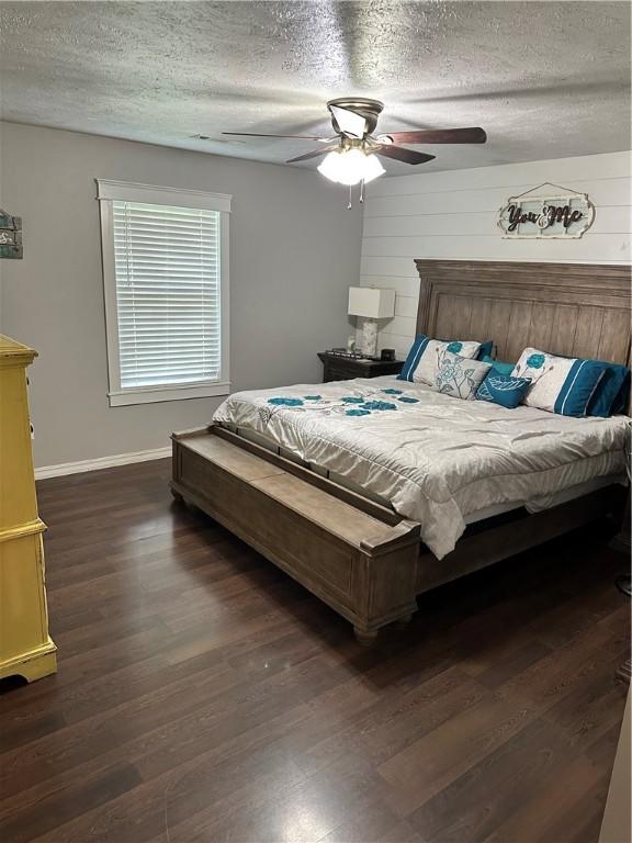 20796 Dawn Hill E Rd, Gentry, AR 72734 - bedroom featuring dark wood-style floors, a textured ceiling, and ceiling fan
