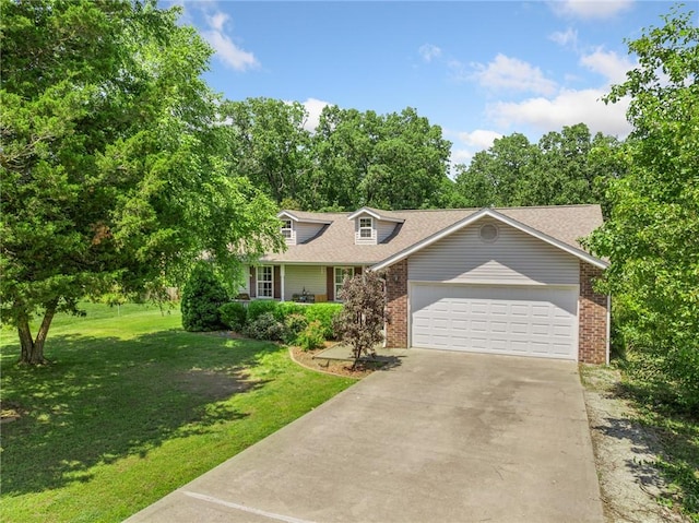 9336 Stonegate Dr, Omaha, AR 72662 - view of front of house featuring brick siding, a front yard, an attached garage, concrete driveway, and a shingled roof