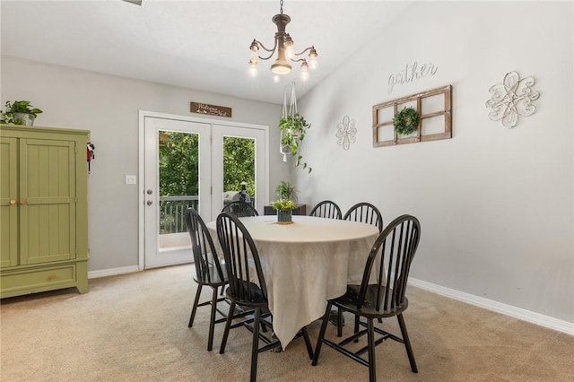 9336 Stonegate Dr, Omaha, AR 72662 - dining room with a chandelier and light carpet