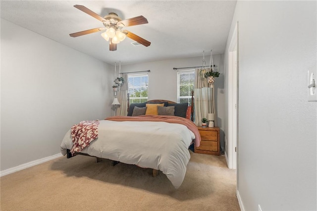 9336 Stonegate Dr, Omaha, AR 72662 - carpeted bedroom featuring baseboards and ceiling fan
