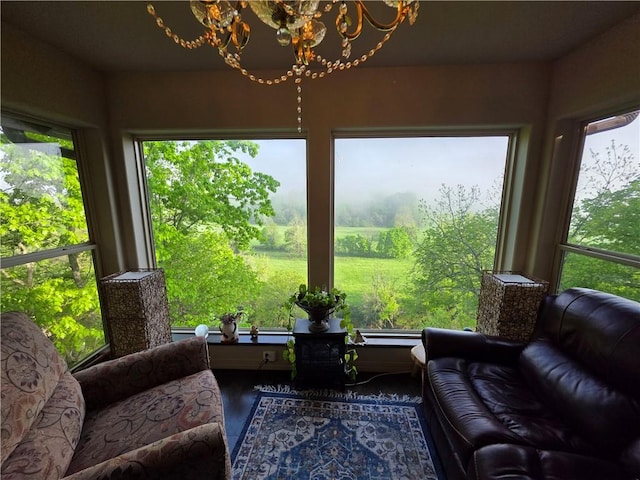 1655 Wilson Springs Rd, Harrison, AR 72601 - sunroom with a chandelier and plenty of natural light