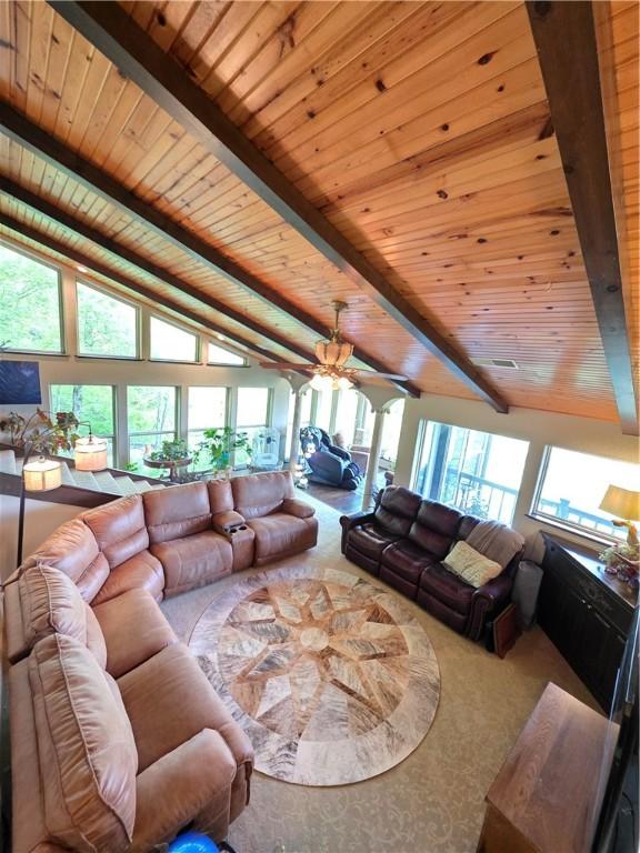 1655 Wilson Springs Rd, Harrison, AR 72601 - living area with wooden ceiling, ornate columns, and carpet floors