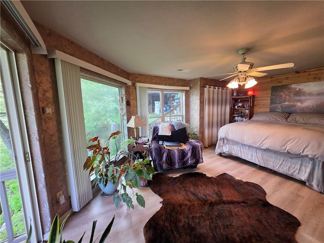 1655 Wilson Springs Rd, Harrison, AR 72601 - bedroom with wood finished floors and a ceiling fan