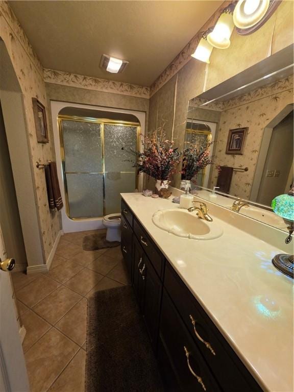 1655 Wilson Springs Rd, Harrison, AR 72601 - bathroom featuring wallpapered walls, a stall shower, tile patterned flooring, and vanity