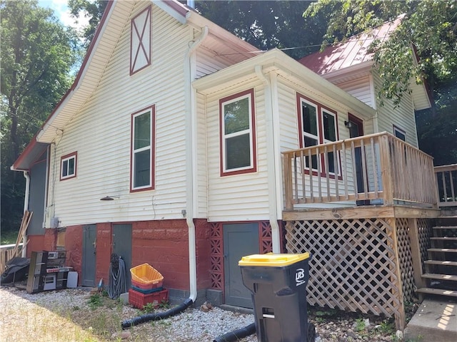1112 Rush Ave, Harrison, AR 72601 - view of side of home with stairway and a wooden deck