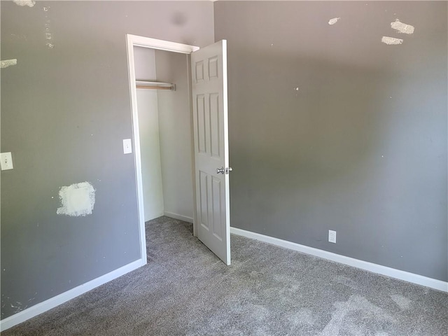 1112 Rush Ave, Harrison, AR 72601 - unfurnished bedroom with carpet flooring and a closet