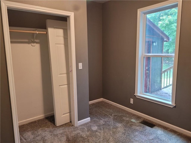 1112 Rush Ave, Harrison, AR 72601 - unfurnished bedroom with carpet flooring and a closet