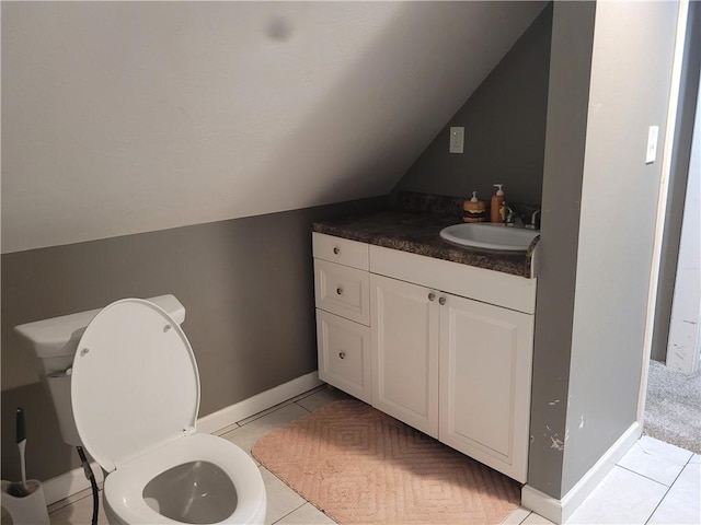 1112 Rush Ave, Harrison, AR 72601 - bathroom featuring lofted ceiling, tile patterned floors, and vanity