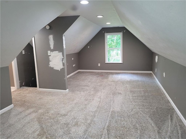 1112 Rush Ave, Harrison, AR 72601 - additional living space featuring carpet floors and vaulted ceiling