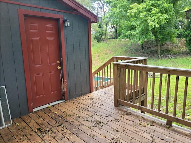 1112 Rush Ave, Harrison, AR 72601 - wooden deck featuring a lawn and an outbuilding