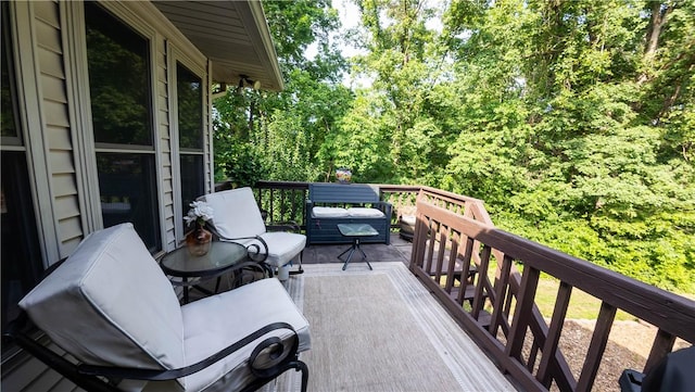 5 Coatbridge Ln, Bella Vista, AR 72715 - deck featuring a forest view