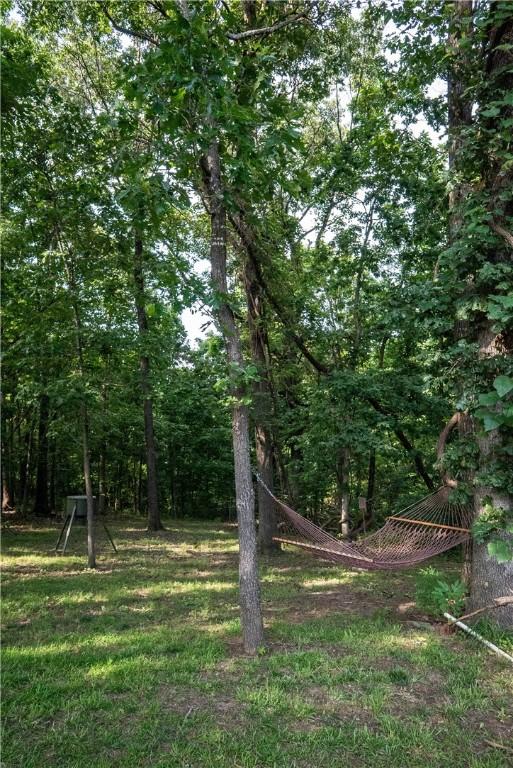 5 Coatbridge Ln, Bella Vista, AR 72715 - view of tree filled area