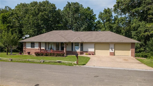 5 Coatbridge Ln, Bella Vista, AR 72715 - single story home featuring brick siding, an attached garage, a porch, and driveway
