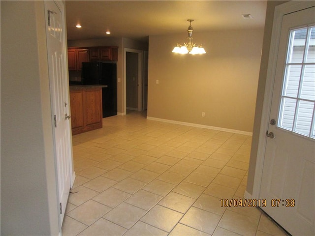 1110 Courage, Siloam Springs, AR 72761 - unfurnished room featuring a chandelier, recessed lighting, and light tile patterned flooring