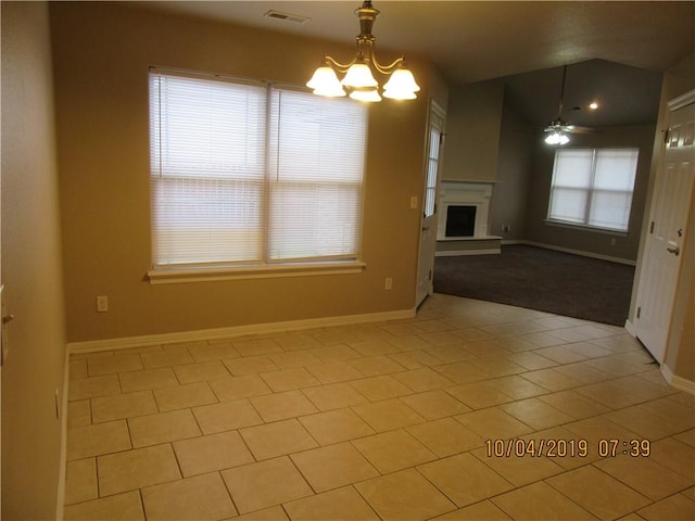 1110 Courage, Siloam Springs, AR 72761 - unfurnished living room featuring a ceiling fan, light tile patterned floors, a chandelier, and a fireplace with raised hearth