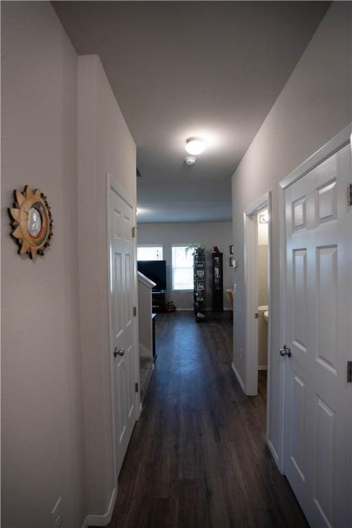 233 Evans St, Huntsville, AR 72740 - corridor with dark wood-type flooring and baseboards