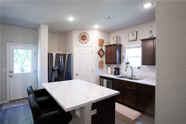 233 Evans St, Huntsville, AR 72740 - kitchen featuring stainless steel appliances, plenty of natural light, dark brown cabinetry, a kitchen island, and recessed lighting