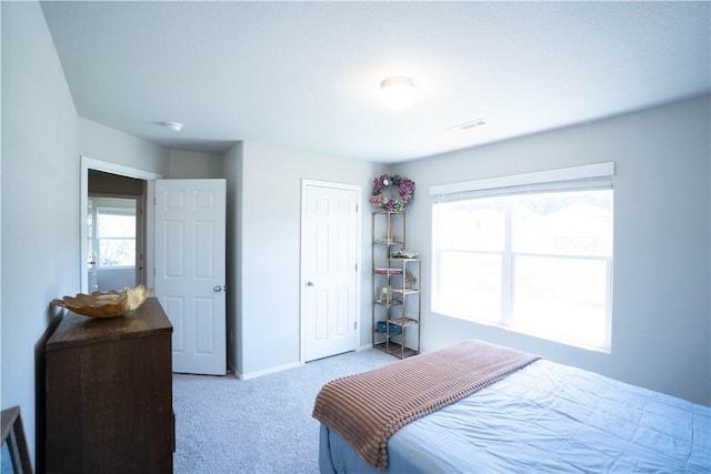 233 Evans St, Huntsville, AR 72740 - carpeted bedroom with baseboards and a closet
