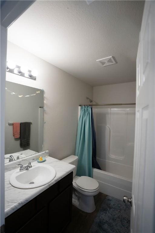 233 Evans St, Huntsville, AR 72740 - bathroom with vanity, shower / bath combination with curtain, and wood finished floors