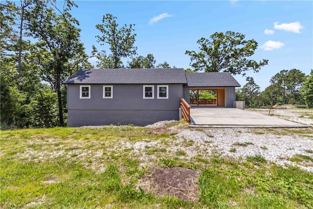 17707 12th Hwy, Rogers, AR 72756 - single story home featuring a carport and concrete driveway