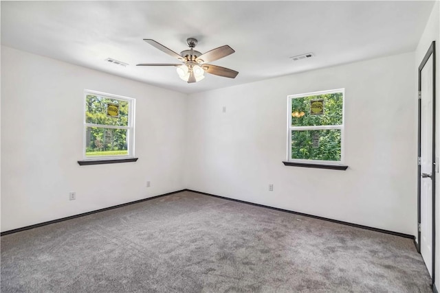 17707 12th Hwy, Rogers, AR 72756 - spare room with healthy amount of natural light, ceiling fan, and carpet floors