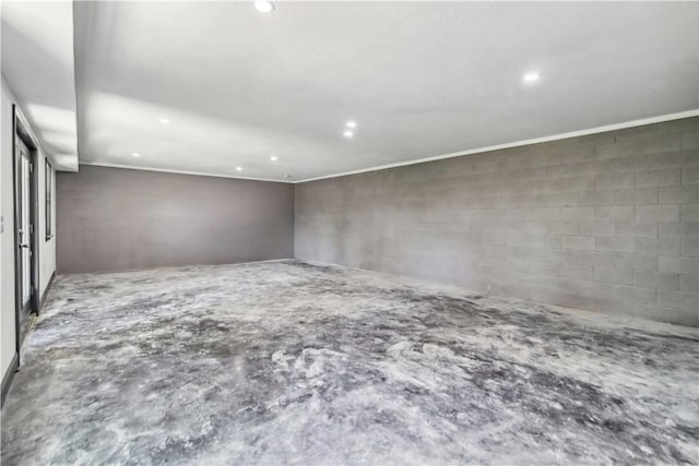 17707 12th Hwy, Rogers, AR 72756 - unfurnished room with concrete block wall, recessed lighting, concrete flooring, and ornamental molding