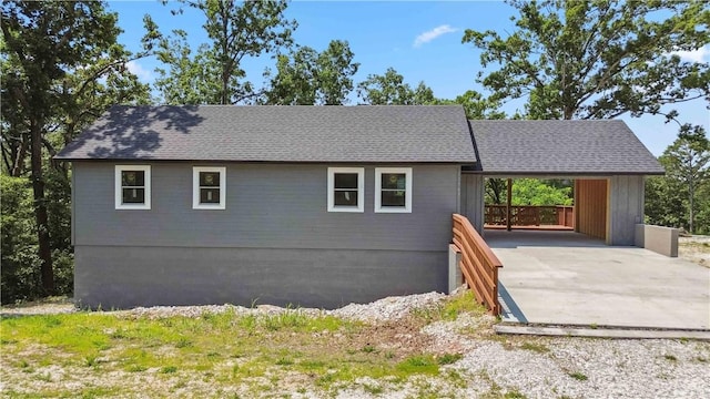 17707 12th Hwy, Rogers, AR 72756 - view of front of house with a carport and concrete driveway