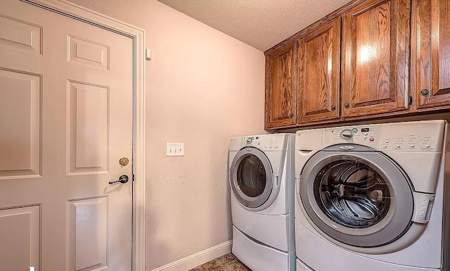 793 Buckhead Ave, Springdale, AR 72764 - laundry room with cabinet space, washer and clothes dryer, and a textured ceiling