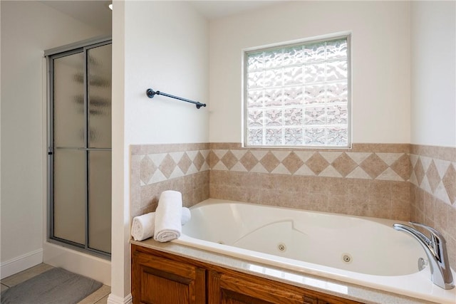793 Buckhead Ave, Springdale, AR 72764 - bathroom featuring a stall shower, a whirlpool tub, and tile patterned floors