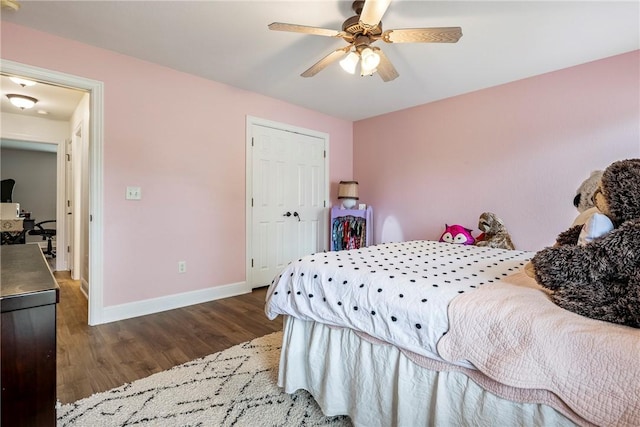 793 Buckhead Ave, Springdale, AR 72764 - bedroom with wood finished floors, a ceiling fan, and a closet